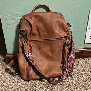Tan Backpack with Patterned Strap